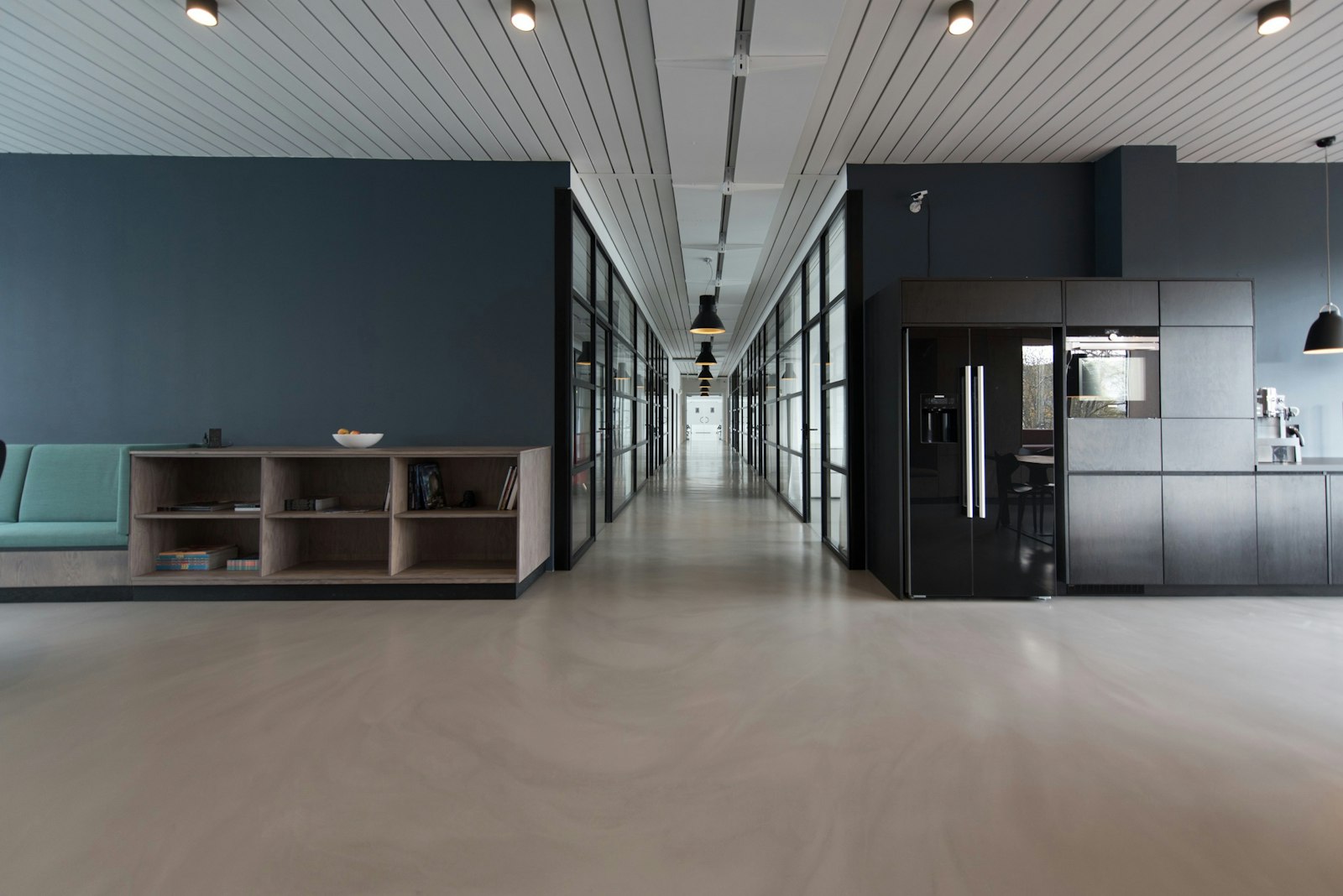 Interior of a quiet modern office with warm lighting, suitable for a planning meeting